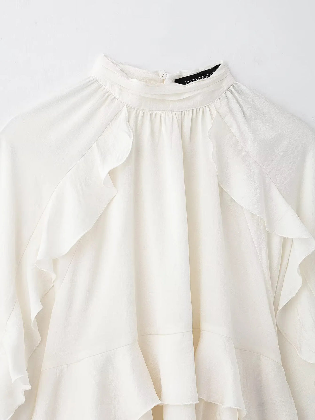 Blusa Romântica com Babados e Mangas Amplas